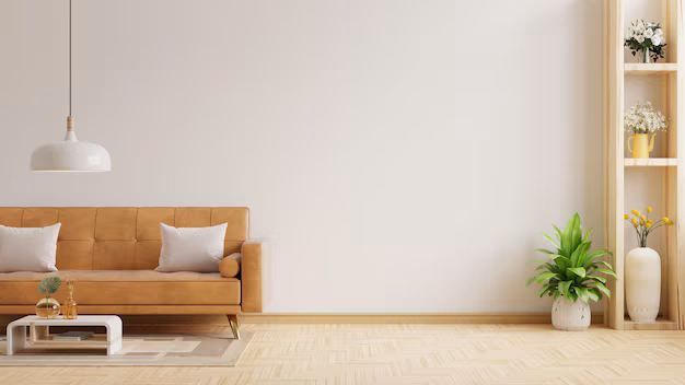 parede-da-sala-de-estar-com-sofa-de-couro-e-decoracao-em-fundo-branco_41470-5018